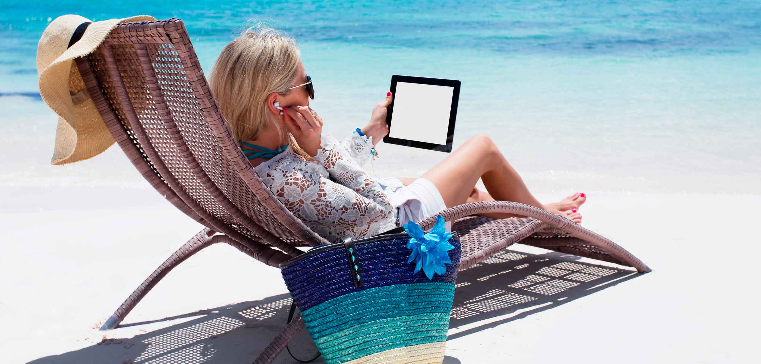 Woman with ipad on a beach using IRES MLS