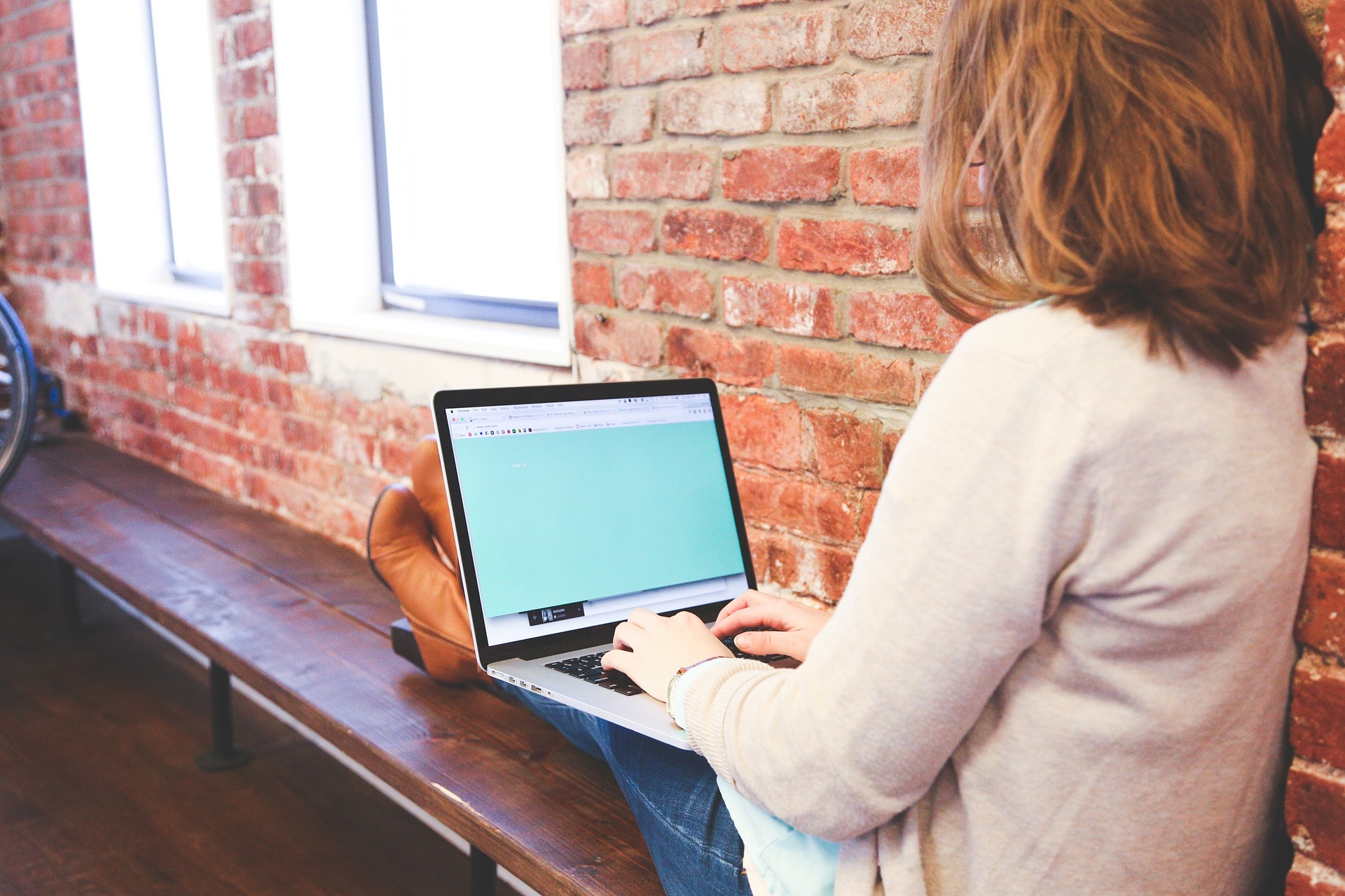 Woman entering a listing in IRES mls.